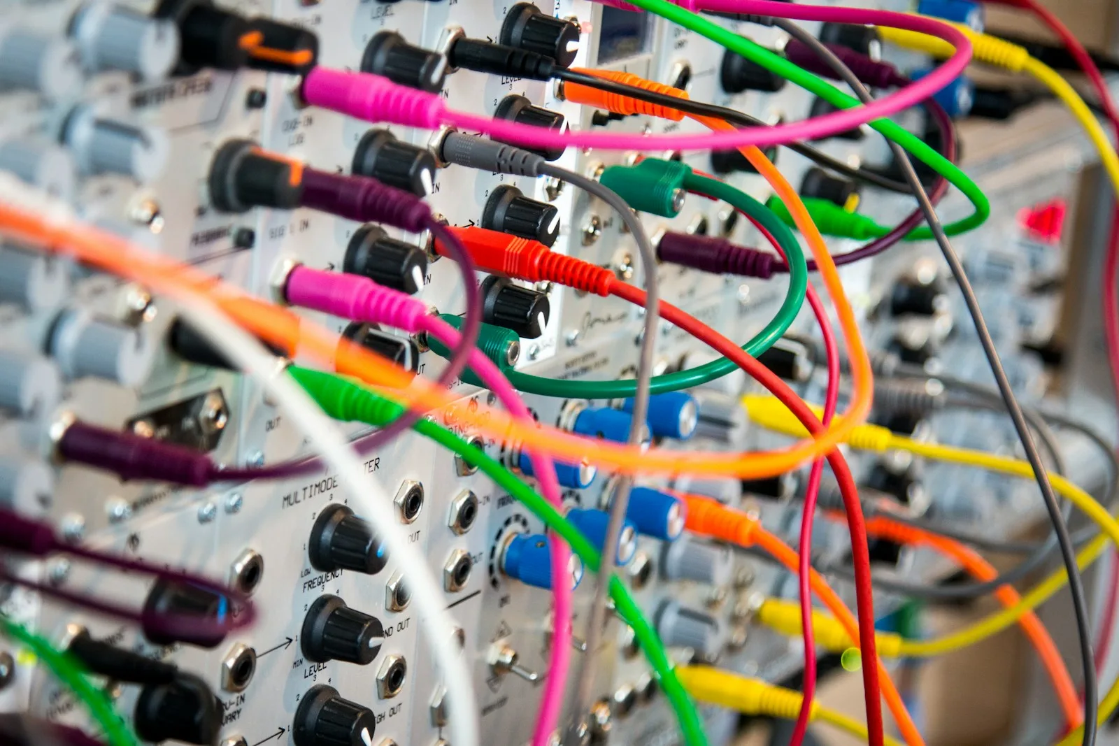 Colorful cables connecting a modular technology system